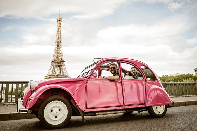 3H Champagne Tour Through Paris by Night in a Pink Citroën 2CV - The Arc de Triomphe and Champs-Élysées