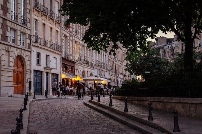 A Magical Evening in Paris With Locals: PRIVATE City Walking Tour - Walking the Champs-Elysées after sunset