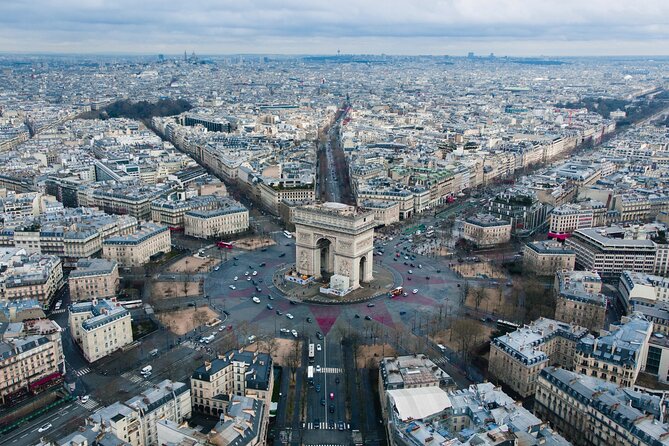 Arc de Triomphe + Rooftop Access Tickets - The stair climb and rooftop payoff