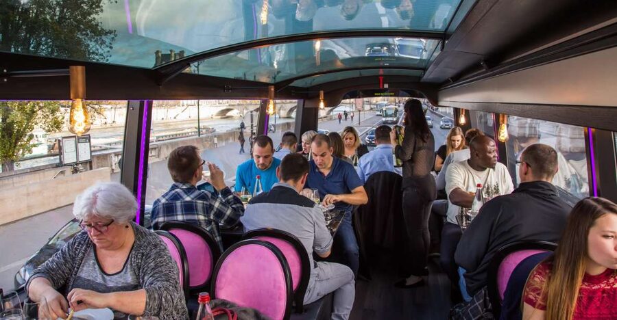 Bus Toqué Champs Elysées Tour w/ 3-Course Dinner & Champagne - A 90-minute route through 96 Paris sights