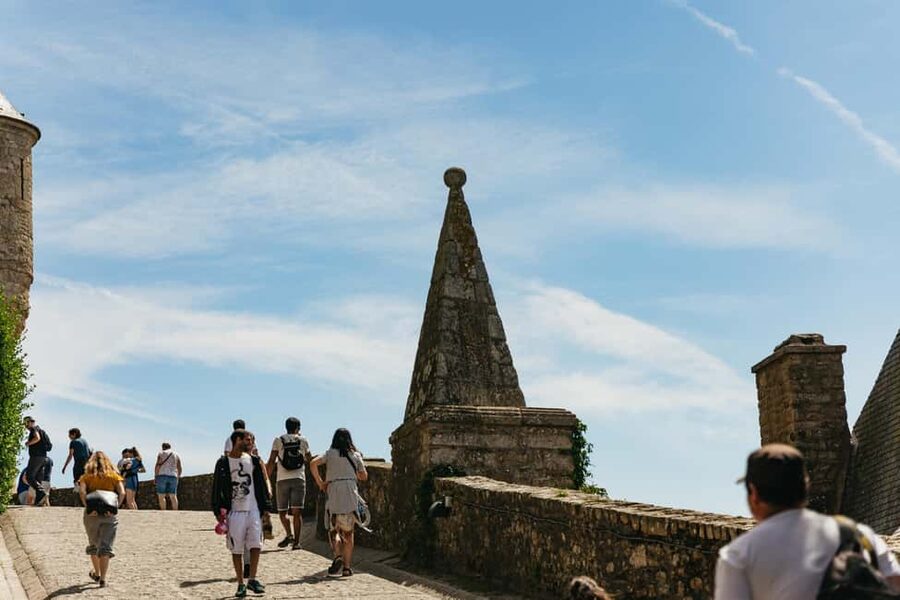 Day Trip to Mont-Saint-Michel from Paris - Approaching the island and taking the shuttle