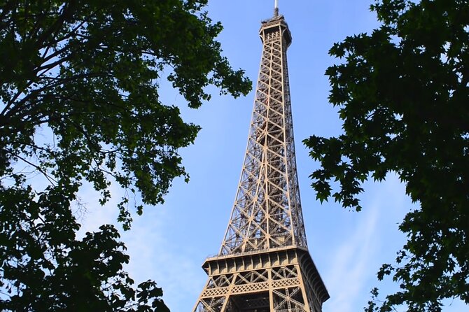 Eiffel Tower Climbing Tour with Summit Access - Taking the elevator to the 906-foot summit