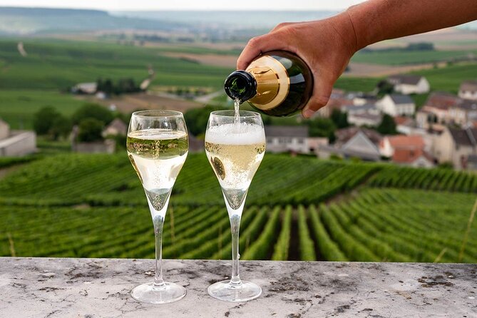 Epernay and Reims Champagne Private Day Trip from Paris - Moët & Chandon: famous name, underground cellars, two glasses