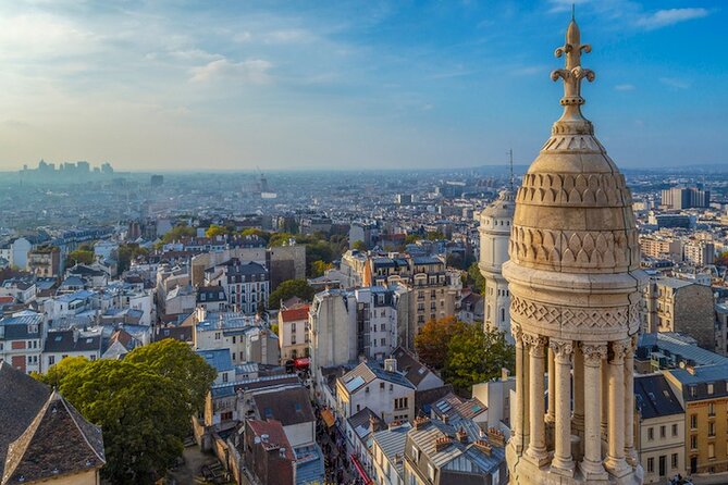 ESSENTIAL MONTMARTRE Walking Tour: the essential highlights+MORE! - A man through a wall, and the stories behind the buildings