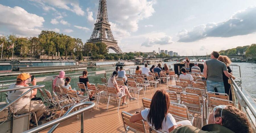From Disneyland Paris: Paris Day Trip and Sightseeing Cruise - Leaving Disneyland Paris by air-conditioned coach