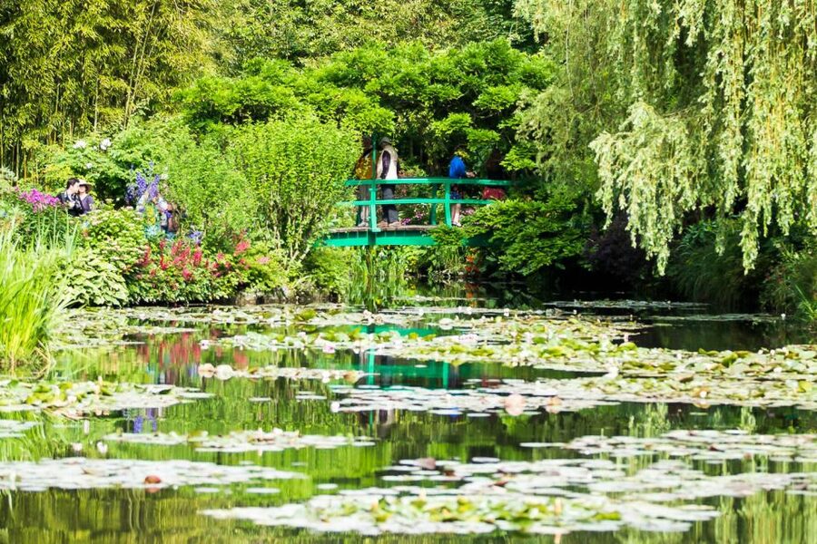 From Paris: Guided Day Trip to Monet's Garden in Giverny - Walking through the Flower Garden