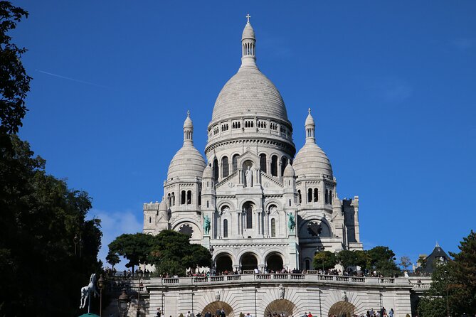 Half-day Walking tour with Fun Guide & Arc du Triomphe Tickets - Moulin Rouge and the Champs-Elysees are photo stops