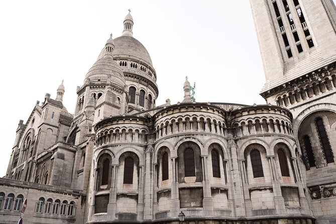Hidden Montmartre: Paris' Secret Streets Walking Tour - Montmartre’s vineyard and the story of Lolo
