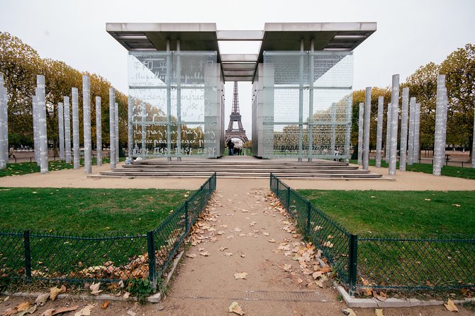 Kickstart Paris Private Tour. City Highlights for Newcomers - The Wall for Peace and the final approach