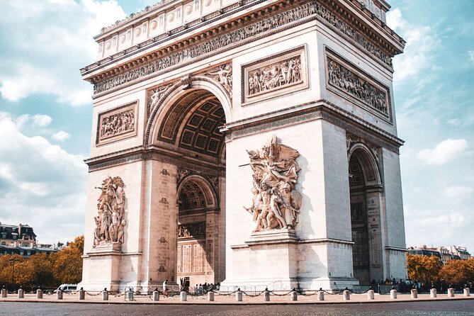 Louvre Museum and Arc de Triumph Tickets with Audio Guide - Entering the Louvre through the Pyramid