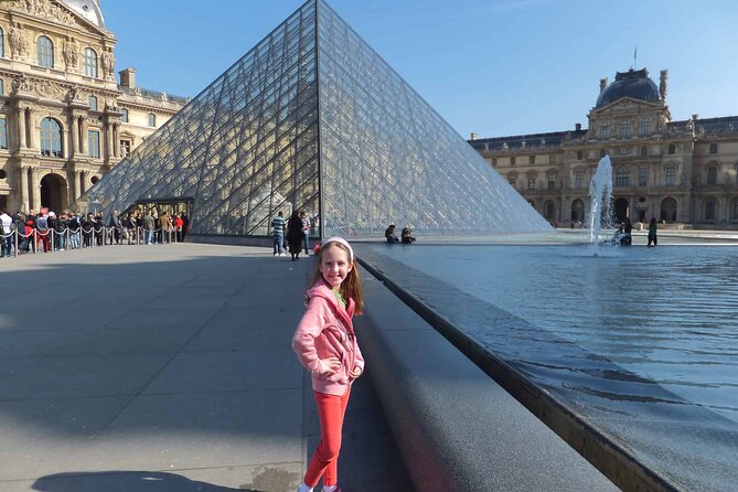 Louvre Museum Entry Ticket with Audio Guide and Mona Lisa Access - Arriving beneath the glass pyramid