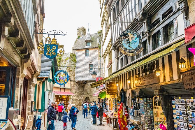 Mont Saint Michel Day Trip from Paris with English Speaking Guide - Reaching the island from the coach parking area