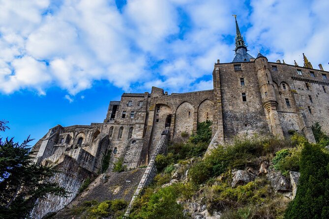 Mont Saint-Michel Small-group by Minivan from Paris with Calvados - Inside the abbey with an official guide