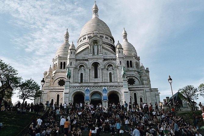 Montmartre District and Sacre Coeur - Exclusive Guided Walking Tour - Why starting at the Moulin Rouge works