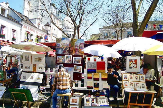Montmartre District and Sacre Coeur - Exclusive Guided Walking Tour - Entering Sacré-Coeur after the climb