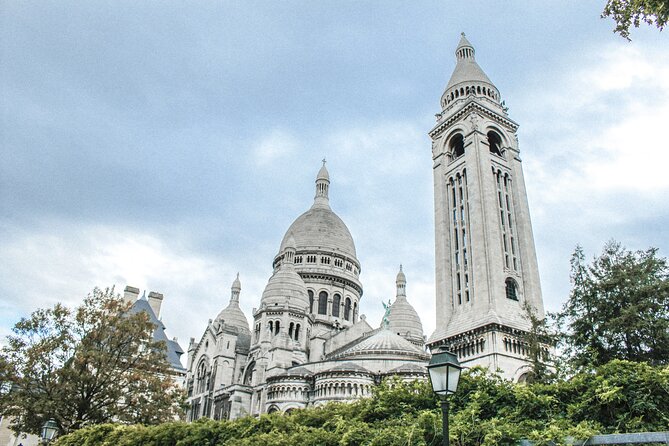 Montmartre: Secret Stories of Paris - Self-Guided Audio Tour - Saint-Pierre, the old church beneath the basilica