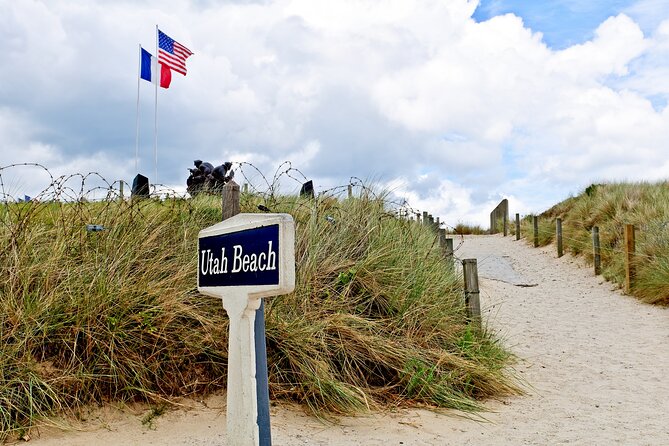Normandy D-Day Sites & Cemetery Day Trip from Paris with Lunch - Pointe du Hoc, craters and cliffs above the Channel