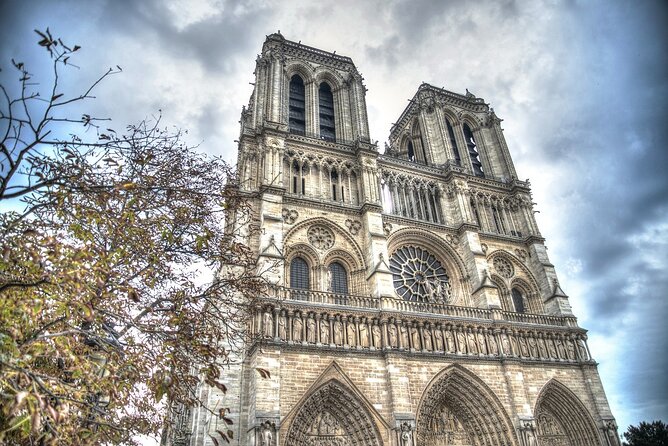 Notre Dame Guided Tour with Scheduled Group Access Option - Meeting at Charlemagne’s statue