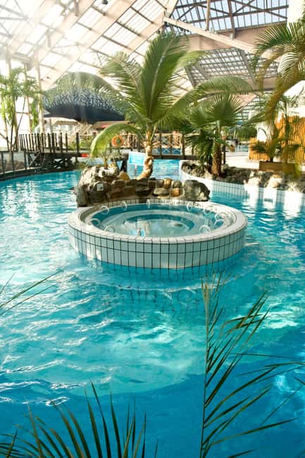 Paris: Aquaboulevard Water Park Entrance Ticket - Wave pools, rope swings, and water play