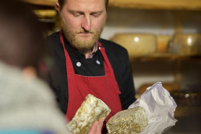 Paris Art of Pairing Cheese and Wine Tasting in a Cheese Cellar - Inside the Living Cheese Museum on Île Saint-Louis