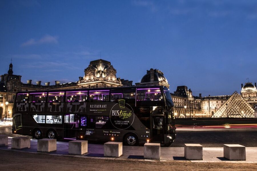 Paris: Bus Toqué Tour with 5-Course Dinner and Champagne - Paris by night from a glass-roofed upper deck
