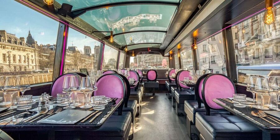 Paris: Bus Toqué Tour with 5-Course Dinner and Champagne - Eating five courses while the city moves