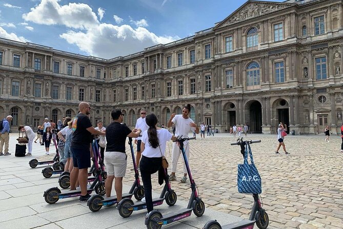 Paris City Tour by E-Scooter with Fun Guide (Small groups) - A riverside return past Paris monuments