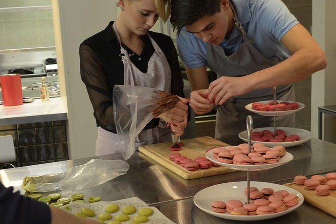 Paris Cooking Class: Learn How to Make Macarons - Mixing meringue shells and choosing colors