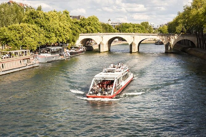Paris: Cruise on The Canal Saint Martin and The Seine River - Notre-Dame, the Louvre, and the Musée d’Orsay