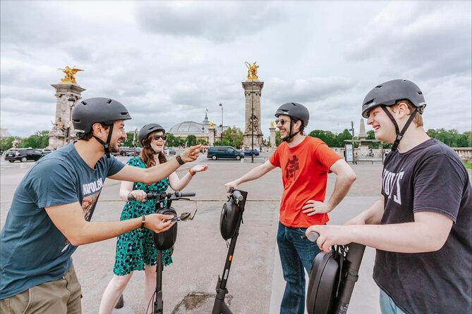 Paris E-Scooter Tour with fun & informative guide (small groups) - Le Marais, coffee, and a useful pause