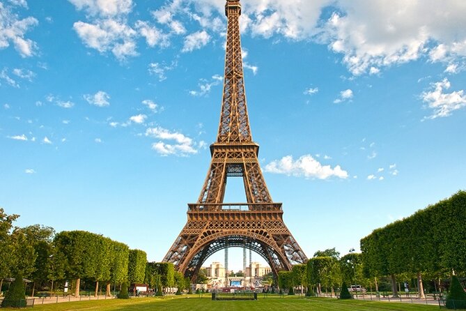 Paris Eiffel Tower, Notre Dame, Louvre and Montmartre Guided Tour - The Eiffel Tower from ground level