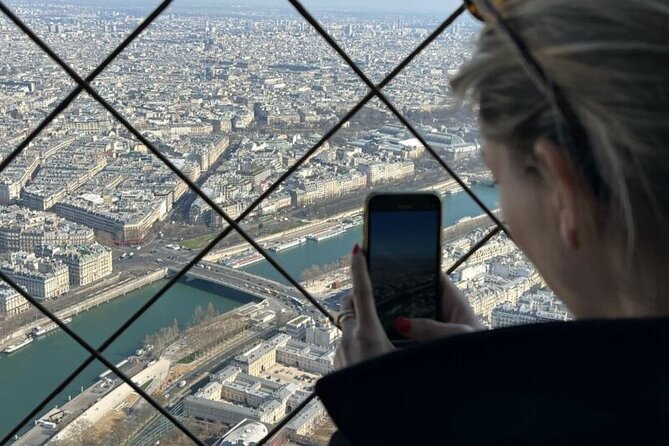 Paris: Eiffel Tower Summit Small-Group Guided Tour Max 6 People - Entering the Eiffel Tower and reaching the second level