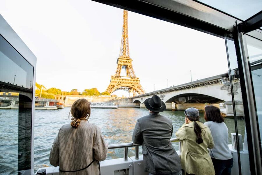 Paris: Eiffel Tower Tour & Seine River Cruise Tour - Reaching the second-floor observation deck