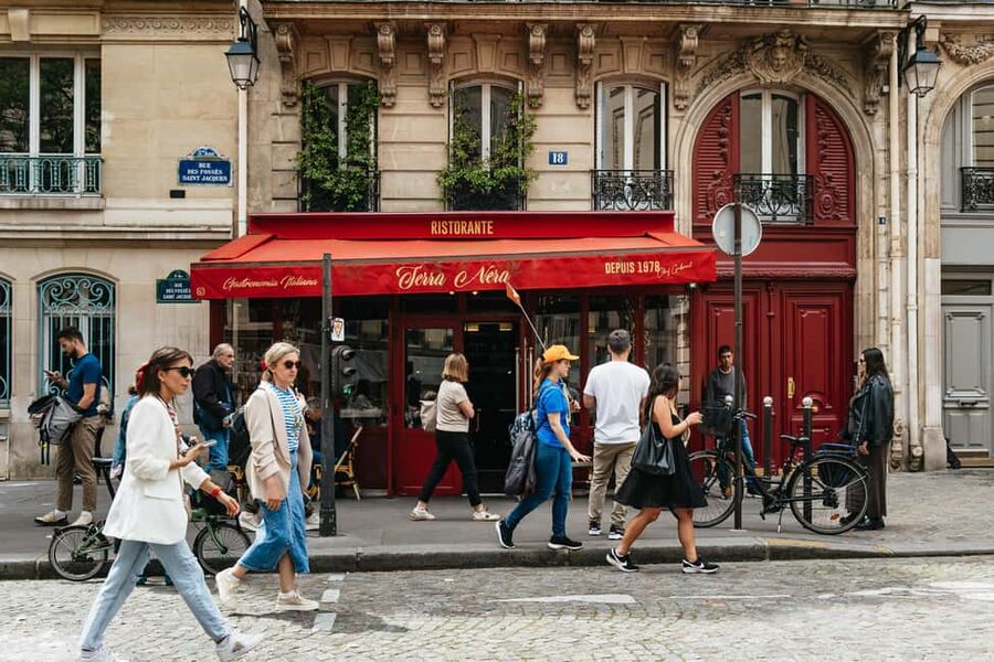 Paris: Emily TV Show Locations Guided Walking Tour - Place de Valois: Emily’s polished working world