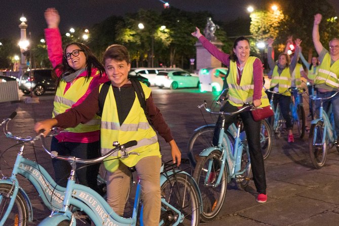 Paris Evening Bike Tour with 1-hour Seine River Cruise - The Louvre courtyard and Pont Neuf