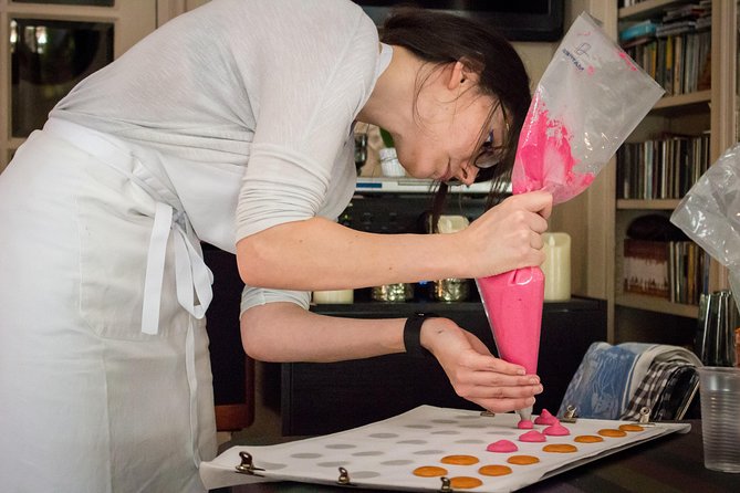 Paris French Macarons Small Group Baking Class with a Chef - Mixing meringue and macaron batter