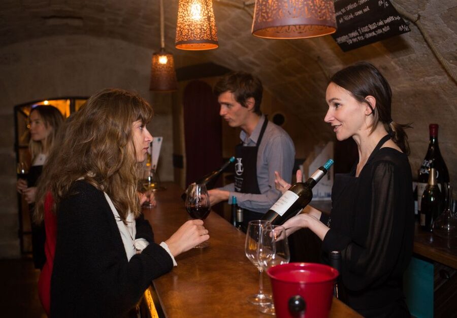 Paris: French Wine Experience in Parisian Cellar - Entering the Caves du Louvre in Central Paris