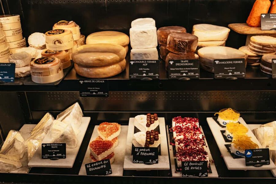 Paris: Gourmet Food Tour with Over 10 Tastings and Wine - Market streets, royal pastry, and a brioche finish