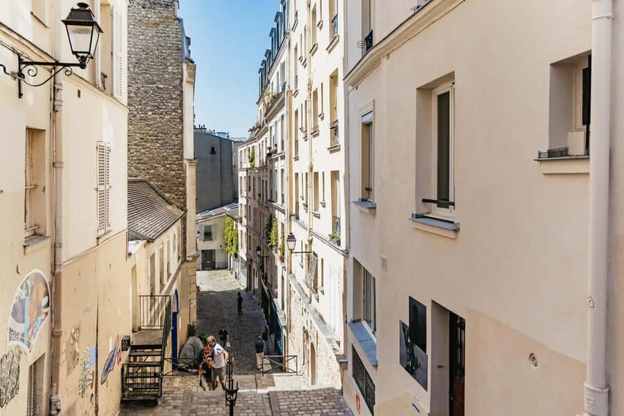 Paris: Hidden Gems of Montmartre with Local Guide - Moulin de la Galette and Montmartre’s social life