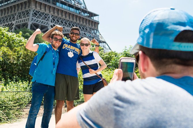 Paris Highlights Bike Tour: Eiffel Tower, Louvre and Notre-Dame - Rue Cler gives the ride a local pause