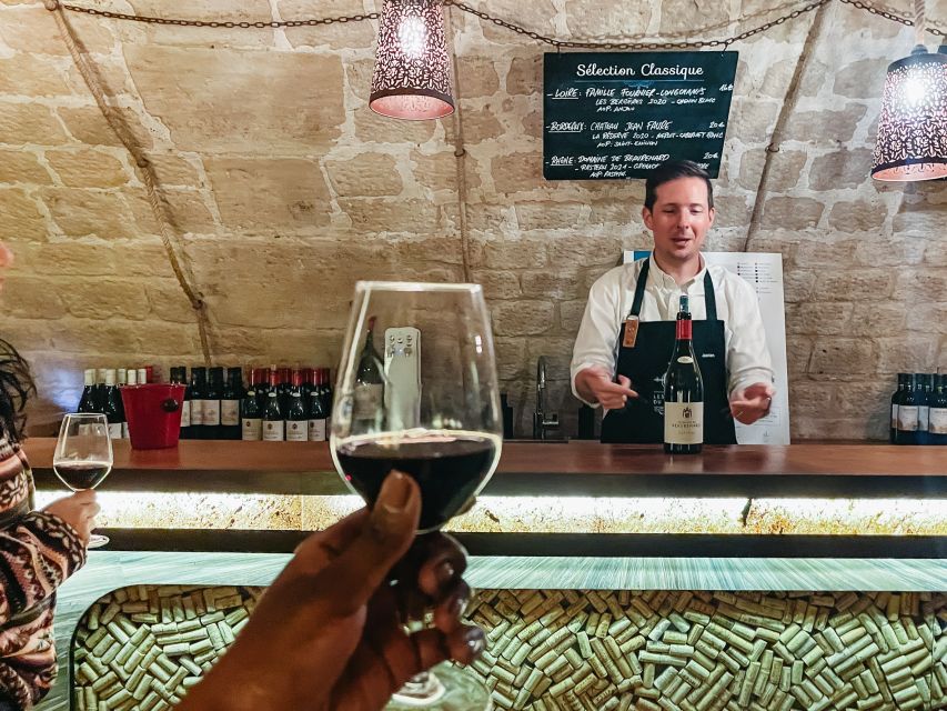 Paris: Les Caves du Louvre Guided Tour with Wine Tastings - The guide makes the difference