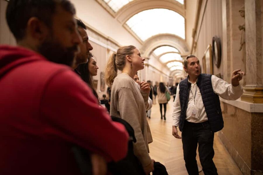 Paris Louvre Exclusive Semi Private Guided Tour Max 6 People - Meeting under Louis XIV before the pyramid