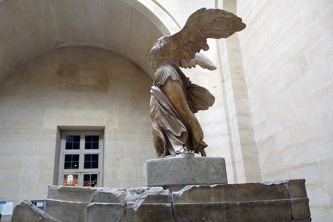 Paris: Louvre Museum Tour Mona Lisa & Iconic Masterpieces - The Louvre palace and its medieval foundations