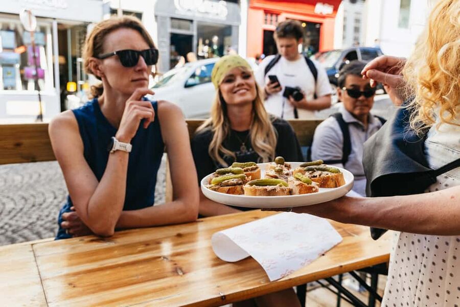 Paris: Montmartre Cheese, Wine & Pastry Guided Walking Tour - Savory stops with cheese, charcuterie, and wine