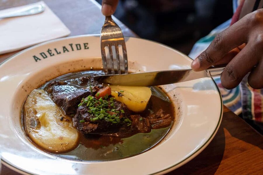 Paris: Montmartre Food Tour with Full Meal - Place du Tertre: famous Montmartre, with food attached