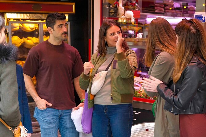 Paris Montmartre Food & Wine Tour with Eating Europe - Sausage and stretchy aligot at Le Saint-Jean