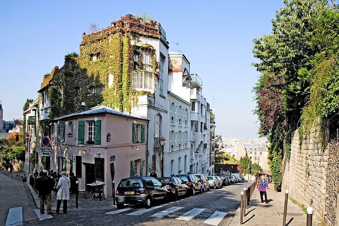 Paris Montmartre Private Walking Tour - Best Art, Culture, Food - Surreal sculpture, Dalida, and the pink café