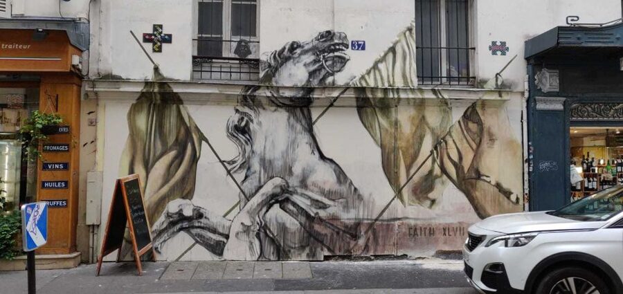 Paris: Montmartre Street Art Tour with an Artist - Starting at Place Blanche and heading uphill