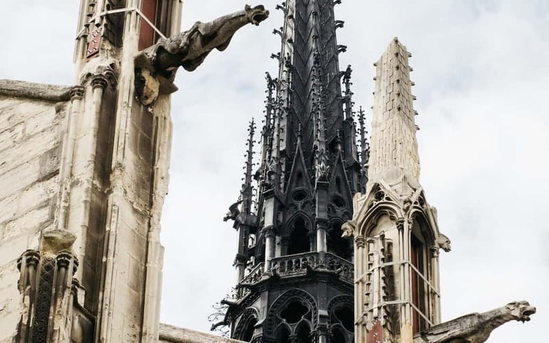 Paris: Notre Dame Exterior Tour with a Small Group - Nine centuries of building, damage, and renewal