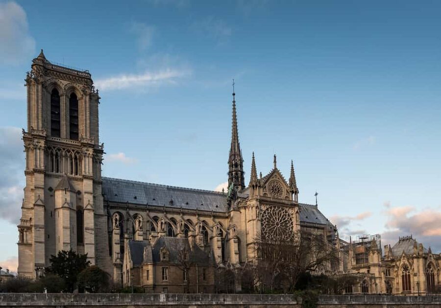 Paris: Notre Dame Outdoor Tour with Sainte-Chapelle / Crypt. - Notre Dame’s façade, fire, and restoration